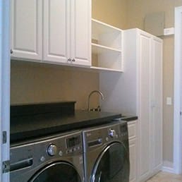 white laundry room cabinets